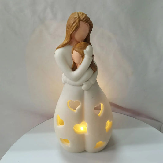 LAMPKA MATKI PRZYTULAJĄCEJ CÓRKĘ